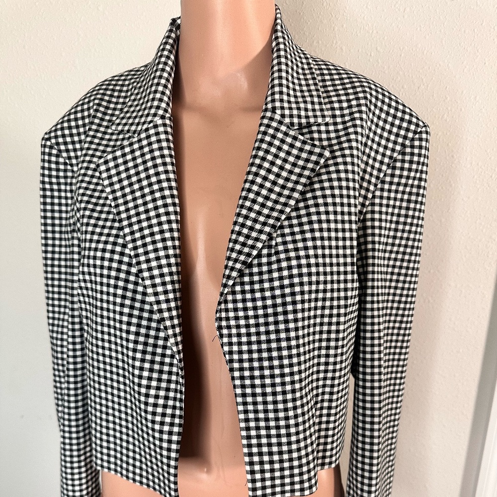 Zara women black and white suit in size medium.